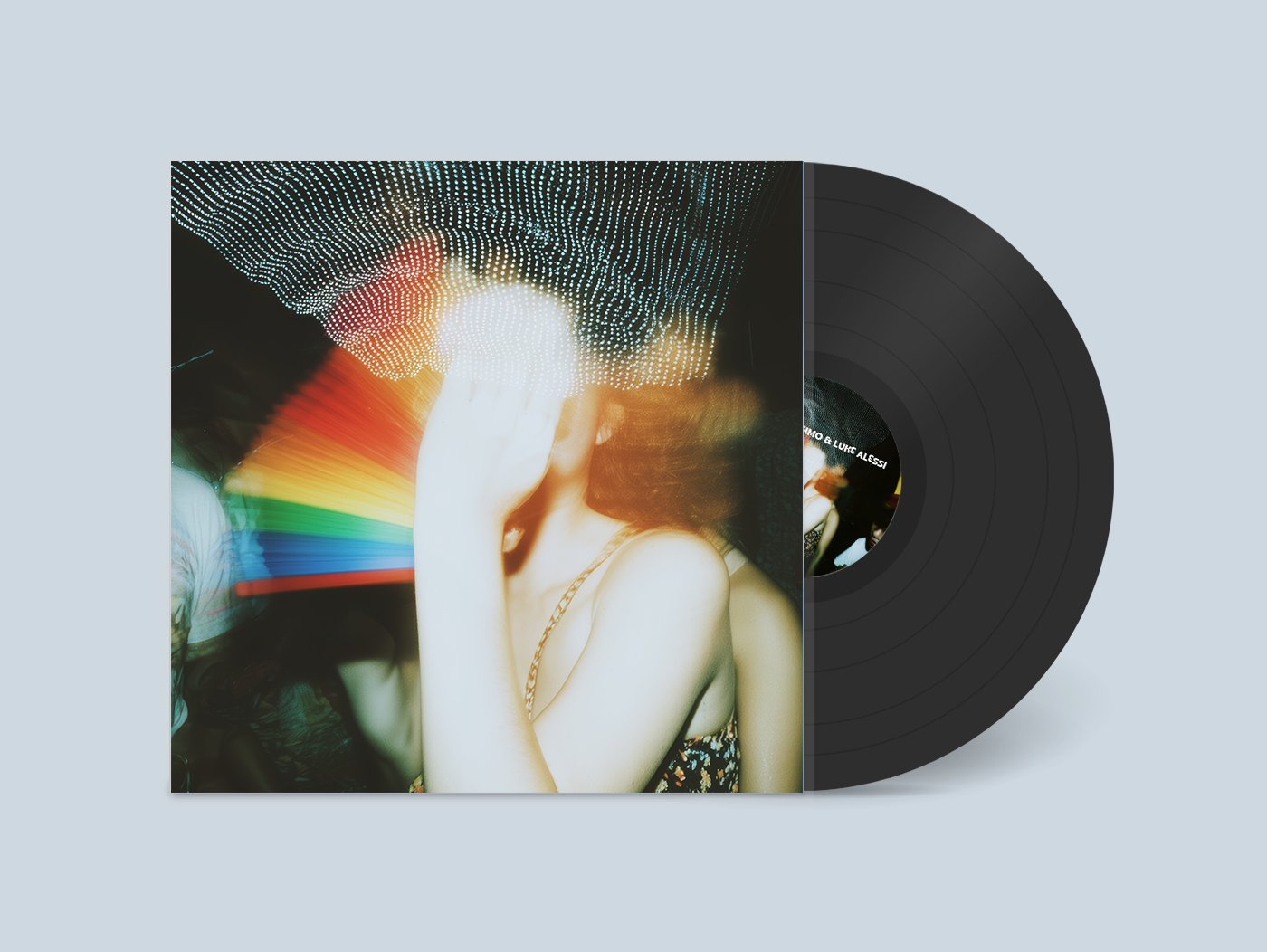 12-inch vinyl edition of Demi Riquísimo & Luke Alessi — Yes Bby: the gatefold sleeve showing the nightclub cover with a rainbow prism streak, a black record sliding out to the right, the record label reading Demi Riquísimo & Luke Alessi.
