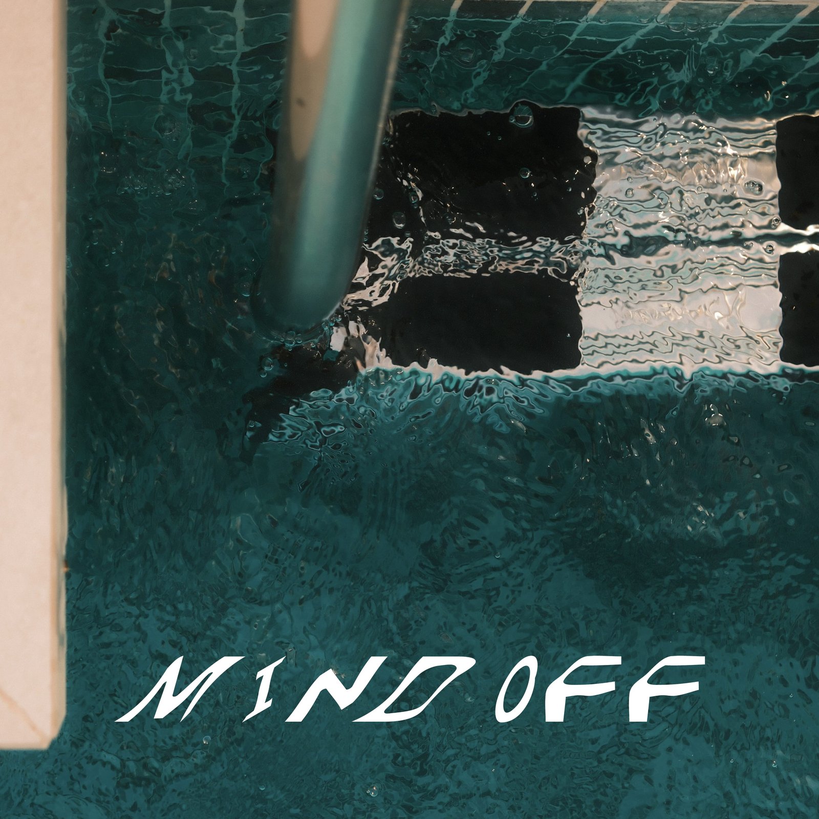 Album cover for Carlita, WhoMadeWho & Orsay — Mind Off: an overhead film photograph of a turquoise swimming pool with a metal ladder handrail and rippling black-and-white tiled water surface, with 'Mind Off' in white italic futuristic lettering across the bottom.